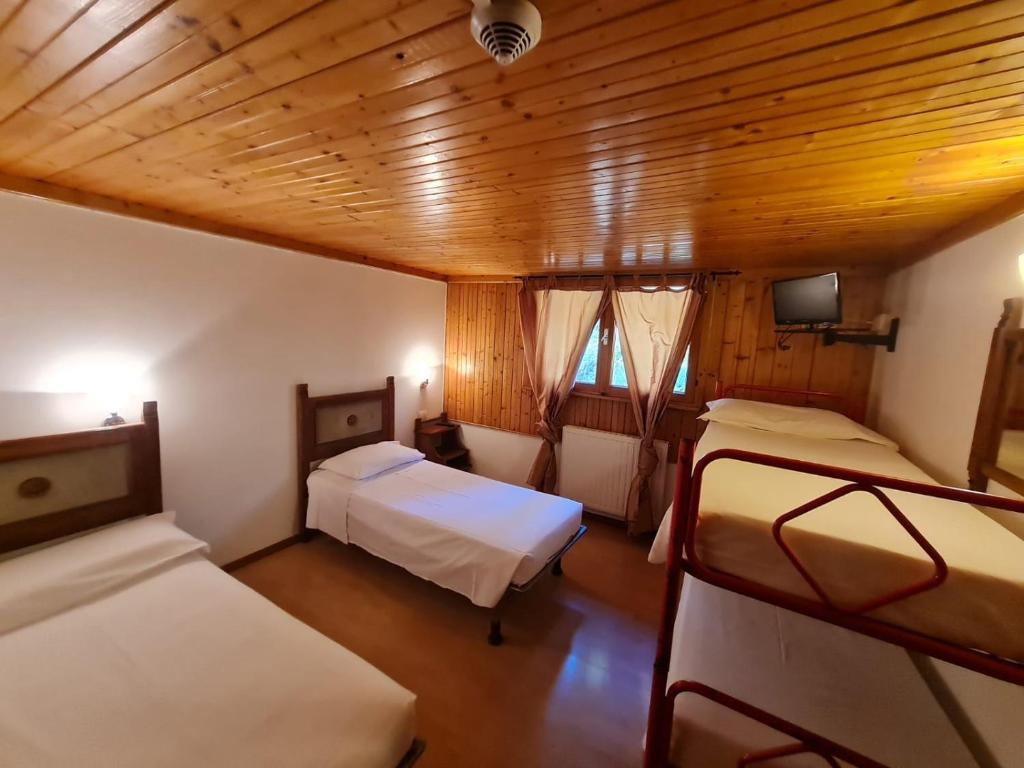 Postel nebo postele na pokoji v ubytování Hostel Il Pirata