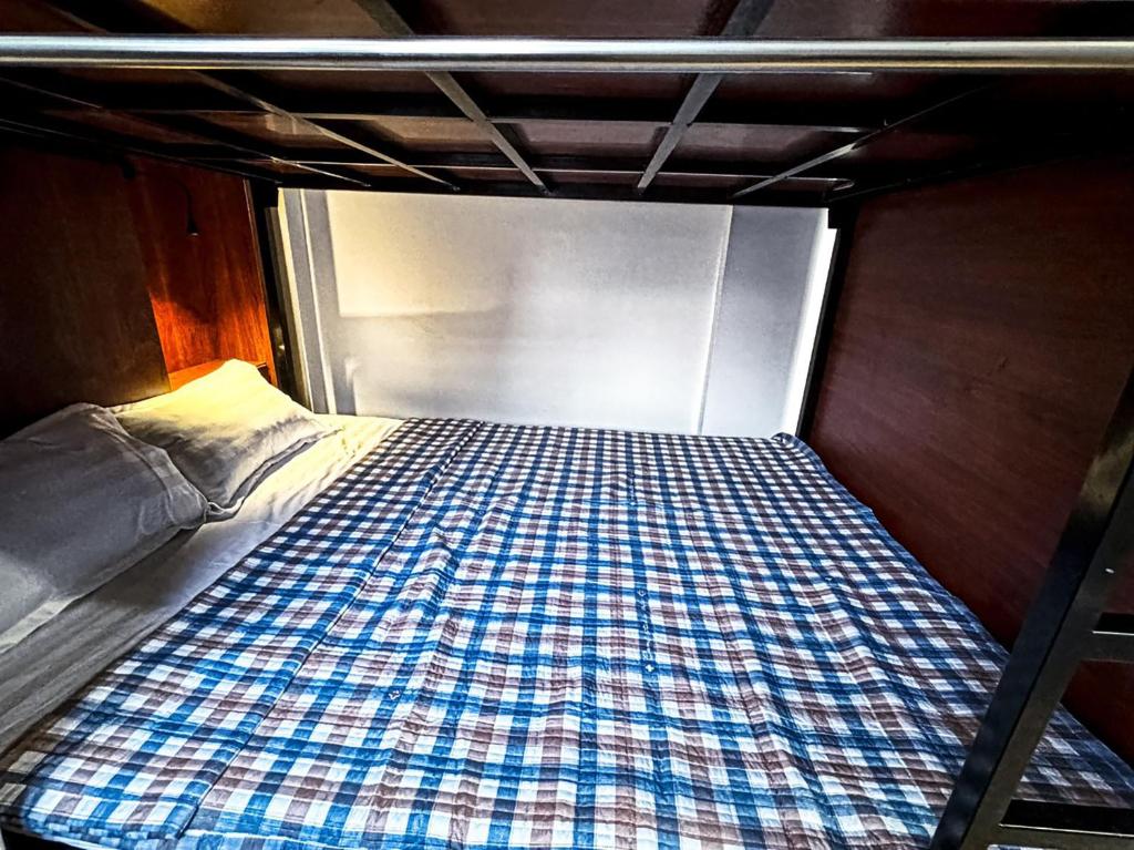Postel nebo postele na pokoji v ubytování Tuna Homestay Hanoi & Experience