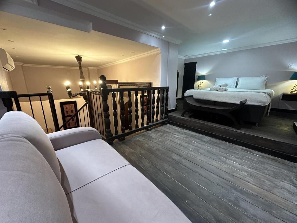 Postel nebo postele na pokoji v ubytování Hotel Boutique Casa Córdoba Estrella