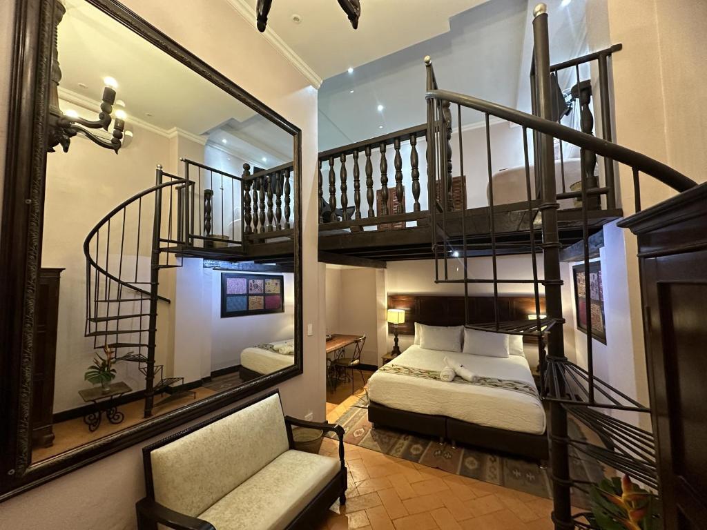 Postel nebo postele na pokoji v ubytování Hotel Boutique Casa Córdoba Estrella