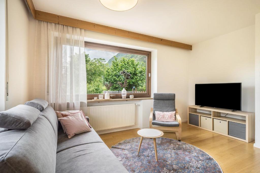 TV a/nebo společenská místnost v ubytování Villa Pinie Apt 2