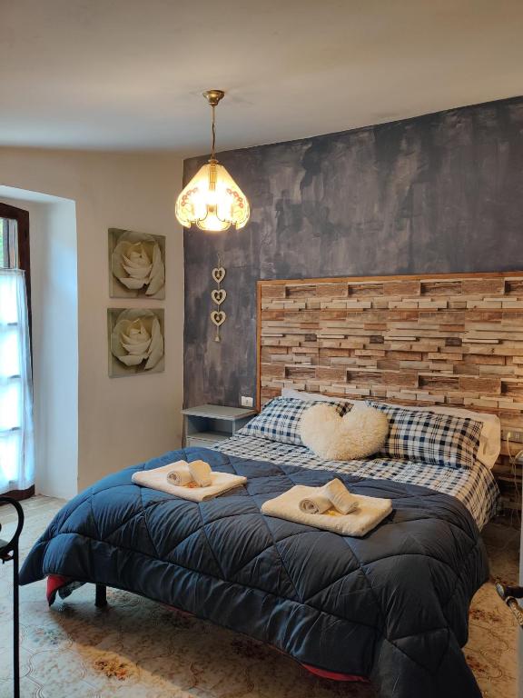 Postel nebo postele na pokoji v ubytování B&B LE GRETTE