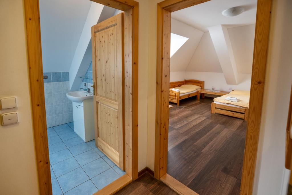 Postel nebo postele na pokoji v ubytování Hotel Stará Ameryka