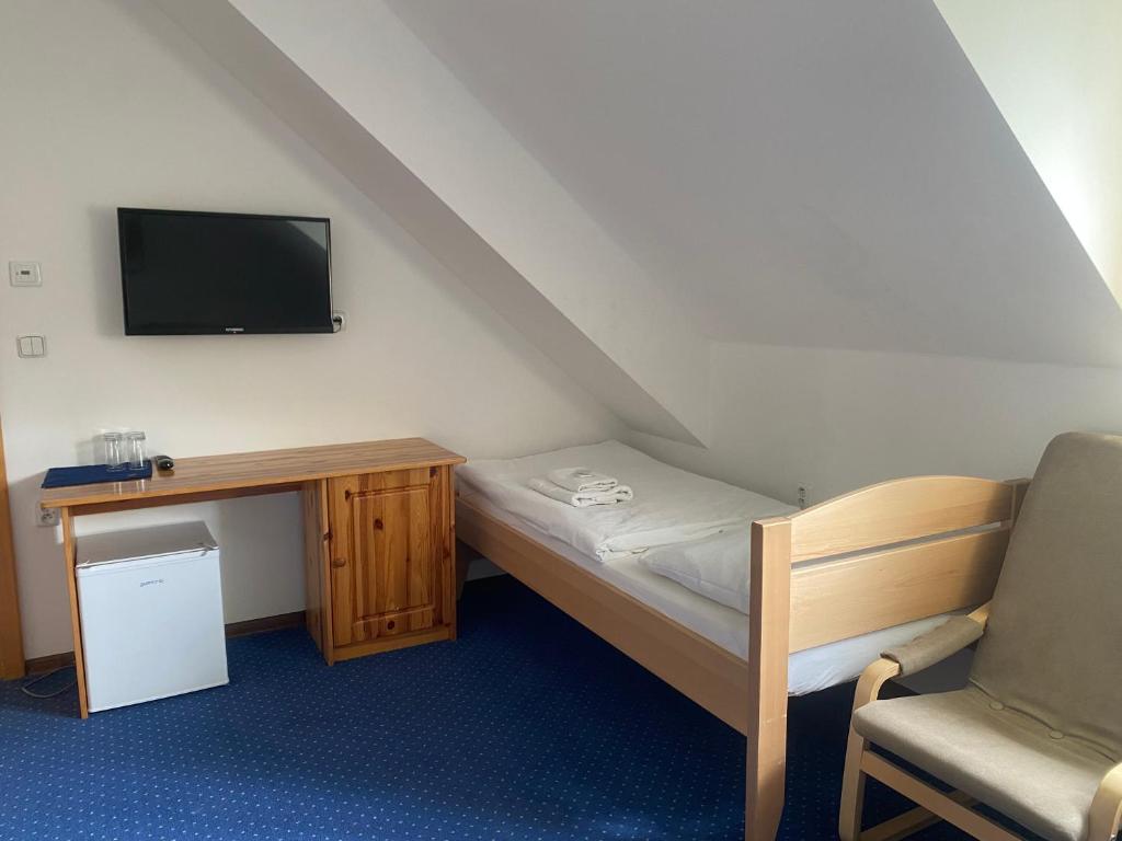 TV a/nebo společenská místnost v ubytování Hotel Stará Ameryka