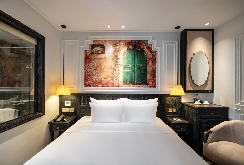 Postel nebo postele na pokoji v ubytování Luxe Paradise Premium Hotel Pham Hong Thai