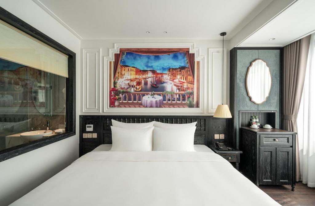 Postel nebo postele na pokoji v ubytování Luxe Paradise Premium Hotel Pham Hong Thai