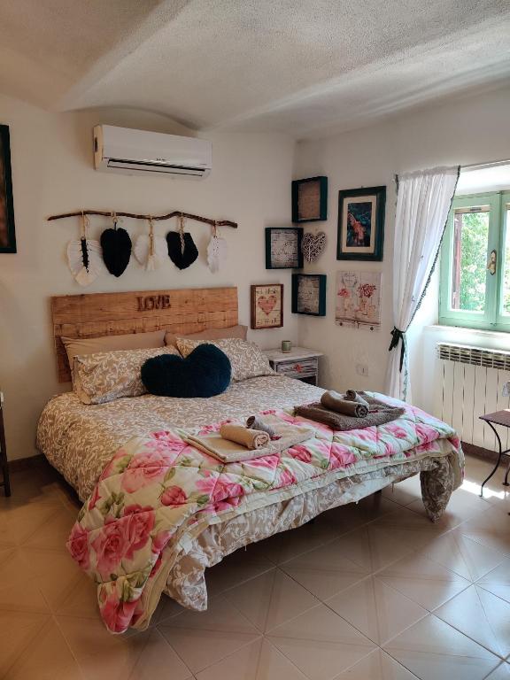 Postel nebo postele na pokoji v ubytování B&B LE GRETTE
