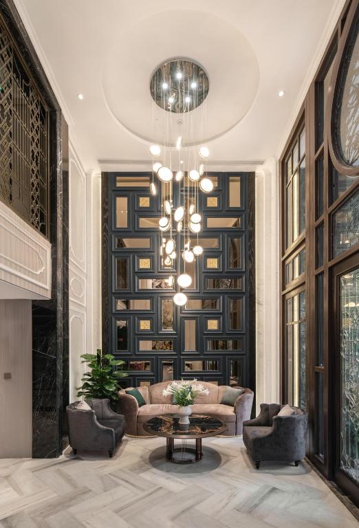 Posezení v ubytování Luxe Paradise Premium Hotel Pham Hong Thai
