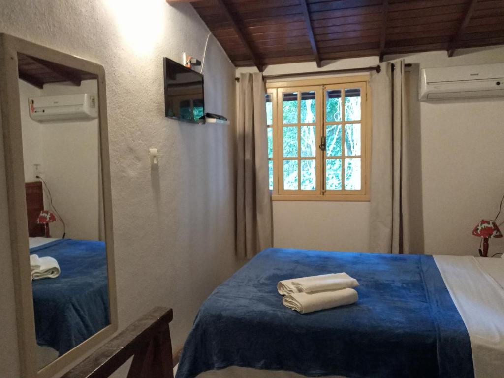 Postel nebo postele na pokoji v ubytování Pitanga Ilha Grande