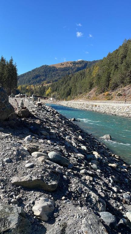 a group of rocks on the side of a river at Ferienwohnung Chow Chow in Nauders