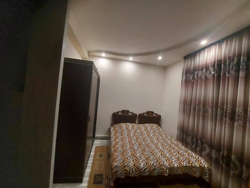 Ένα ή περισσότερα κρεβάτια σε δωμάτιο στο Nika Hangstigoti