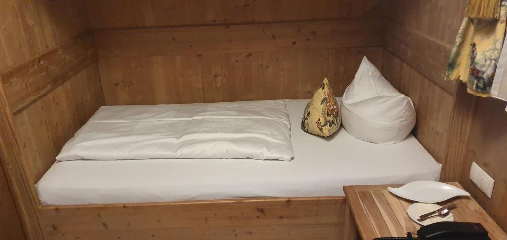 Postel nebo postele na pokoji v ubytování Hotel Leeberghof