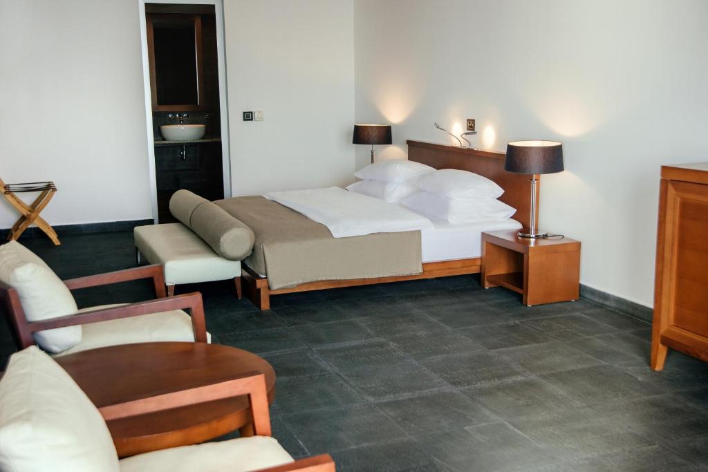 Postel nebo postele na pokoji v ubytování Avala Resort & Villas