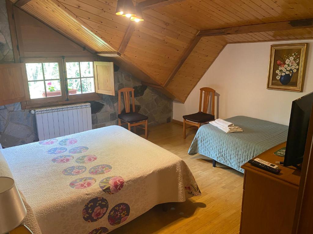 Posteľ alebo postele v izbe v ubytovaní Hotel Rural Camino Medulas