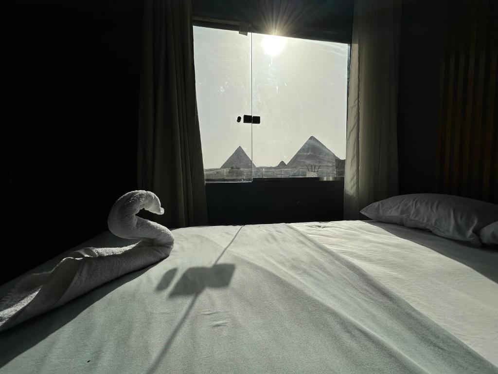 Krevet ili kreveti u jedinici u okviru objekta El 3 Amici pyramids inn