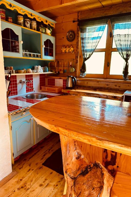 Kuchyň nebo kuchyňský kout v ubytování Mountain story apartment