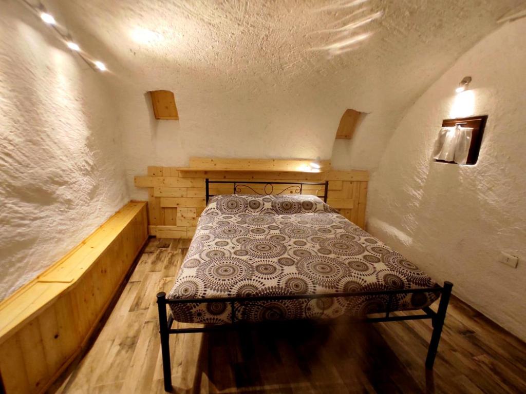 Postel nebo postele na pokoji v ubytování Antico Borgo Lago di Como