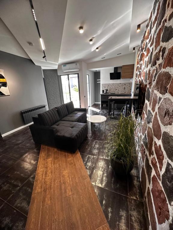 Kuchyň nebo kuchyňský kout v ubytování Garden Lounge Hotel