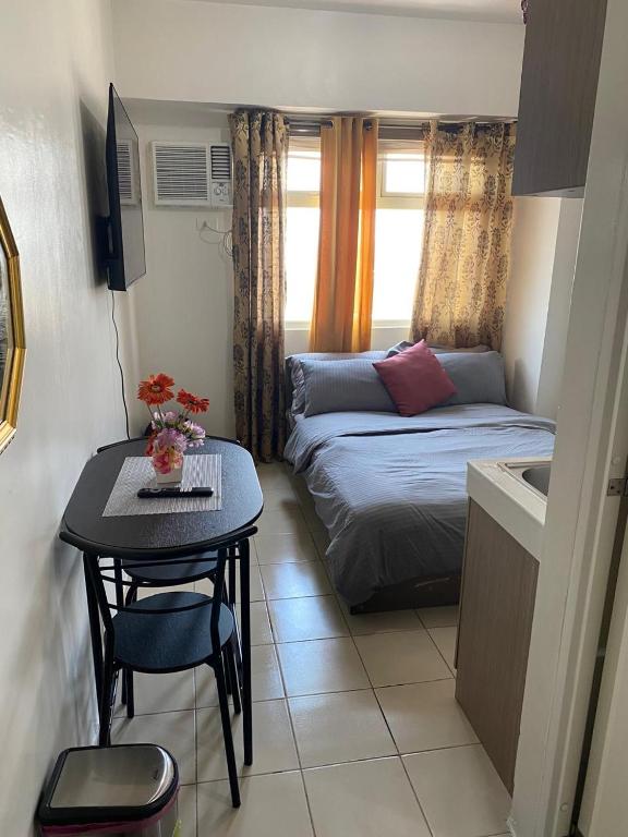 Postel nebo postele na pokoji v ubytování Onatacondotel