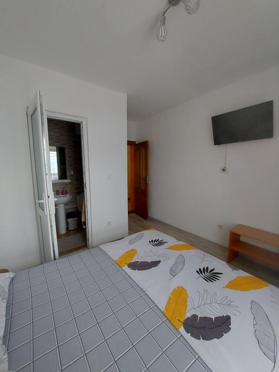 TV a/nebo společenská místnost v ubytování CASA DALYS