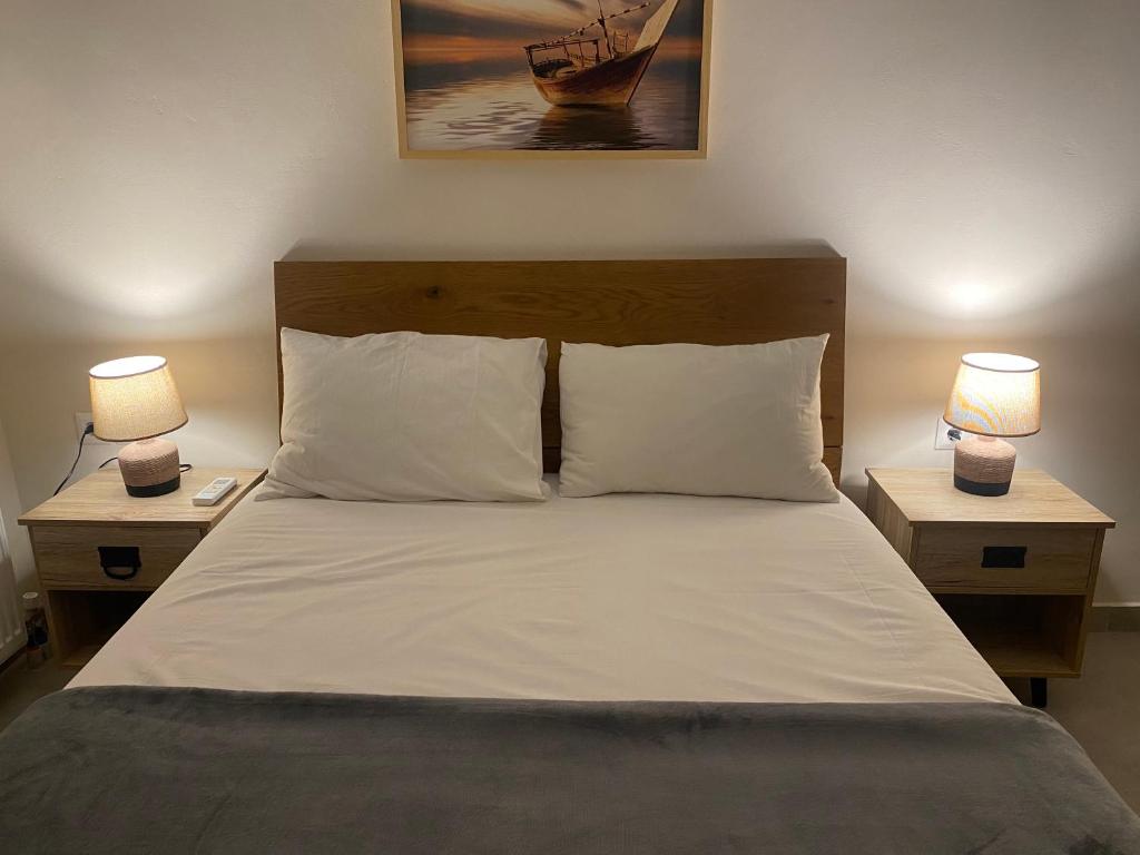 A bed or beds in a room at lividio apartment