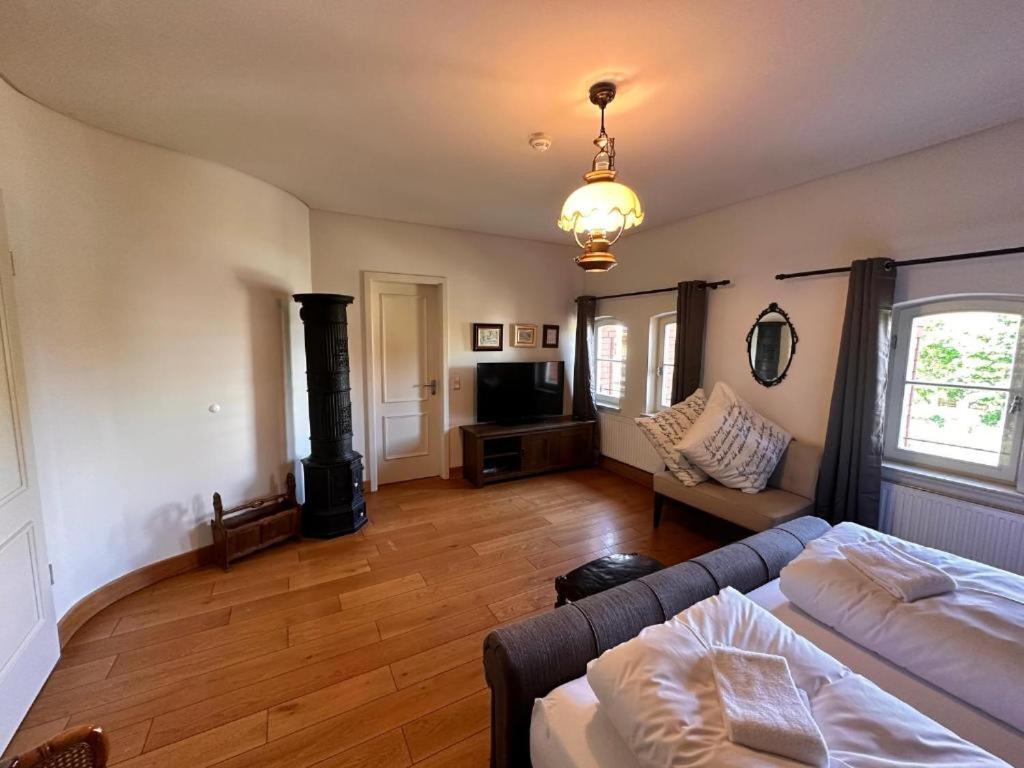 Postel nebo postele na pokoji v ubytování Altstadthotel Ilsenburg