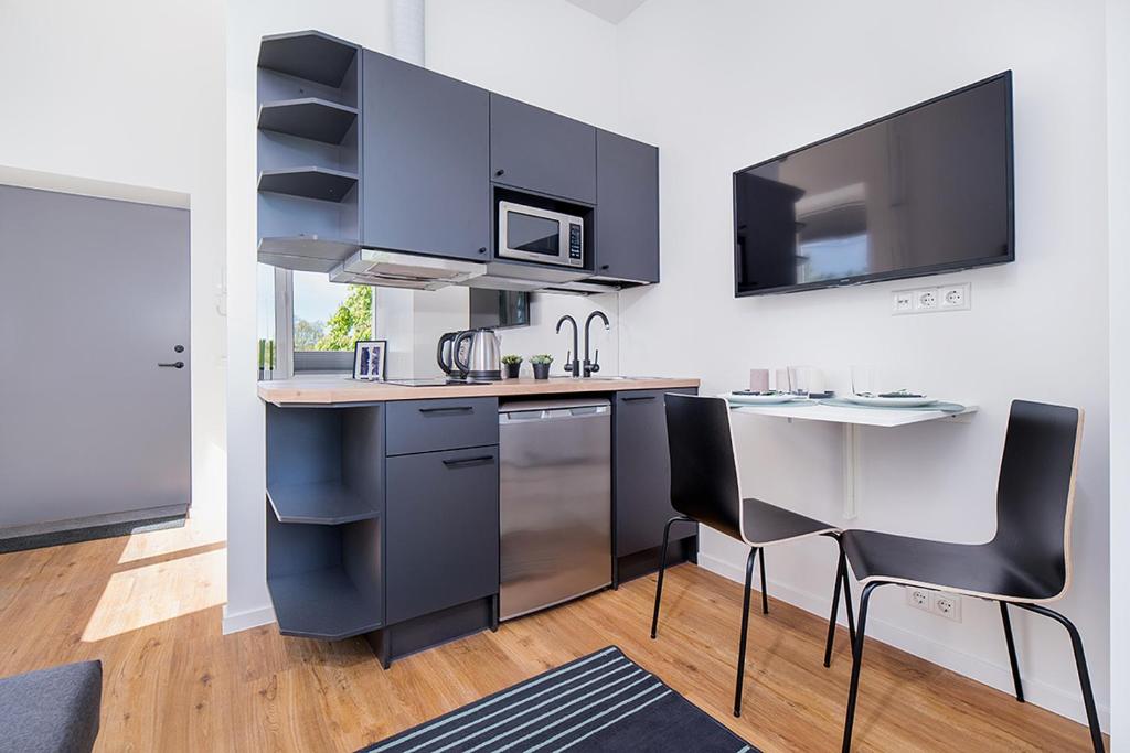 Kuchyň nebo kuchyňský kout v ubytování Laki 24 Apartments by EasyRentals