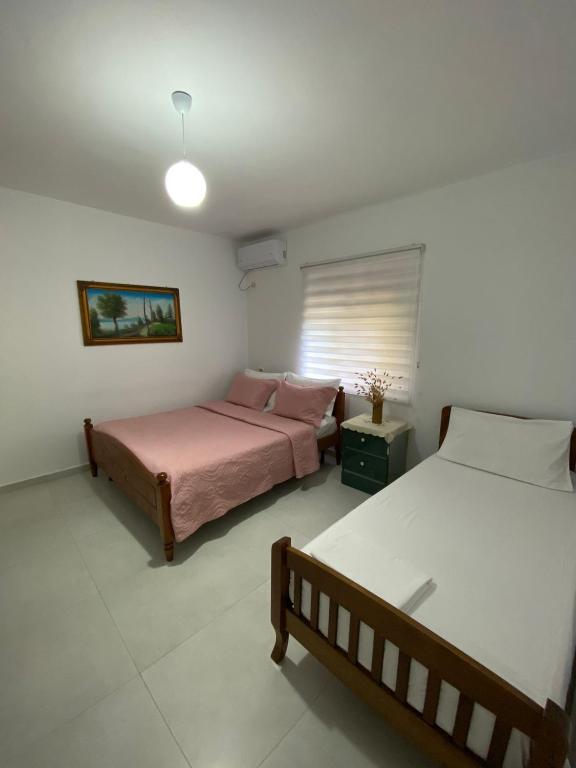 Postel nebo postele na pokoji v ubytování Kristel Holiday Home