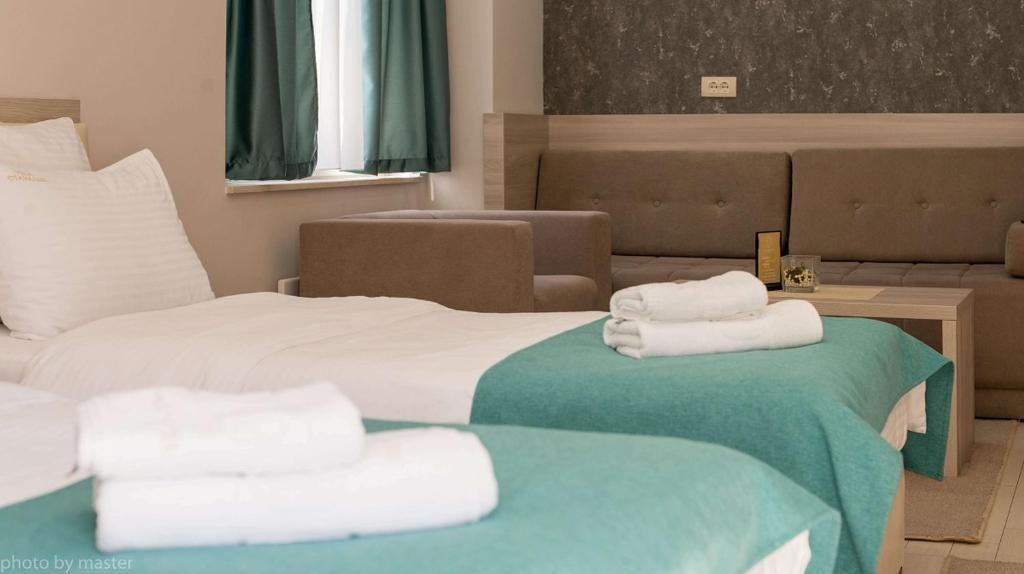 Voodi või voodid majutusasutuse Villa Otava Lux SPA toas