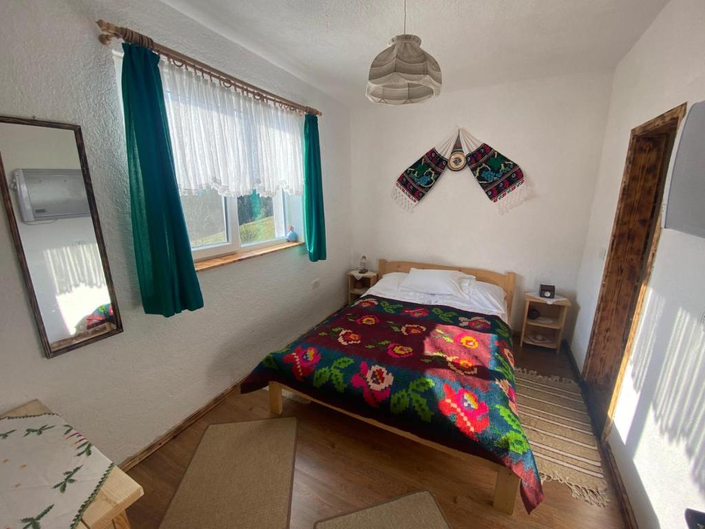 Postel nebo postele na pokoji v ubytování Casa Teodora