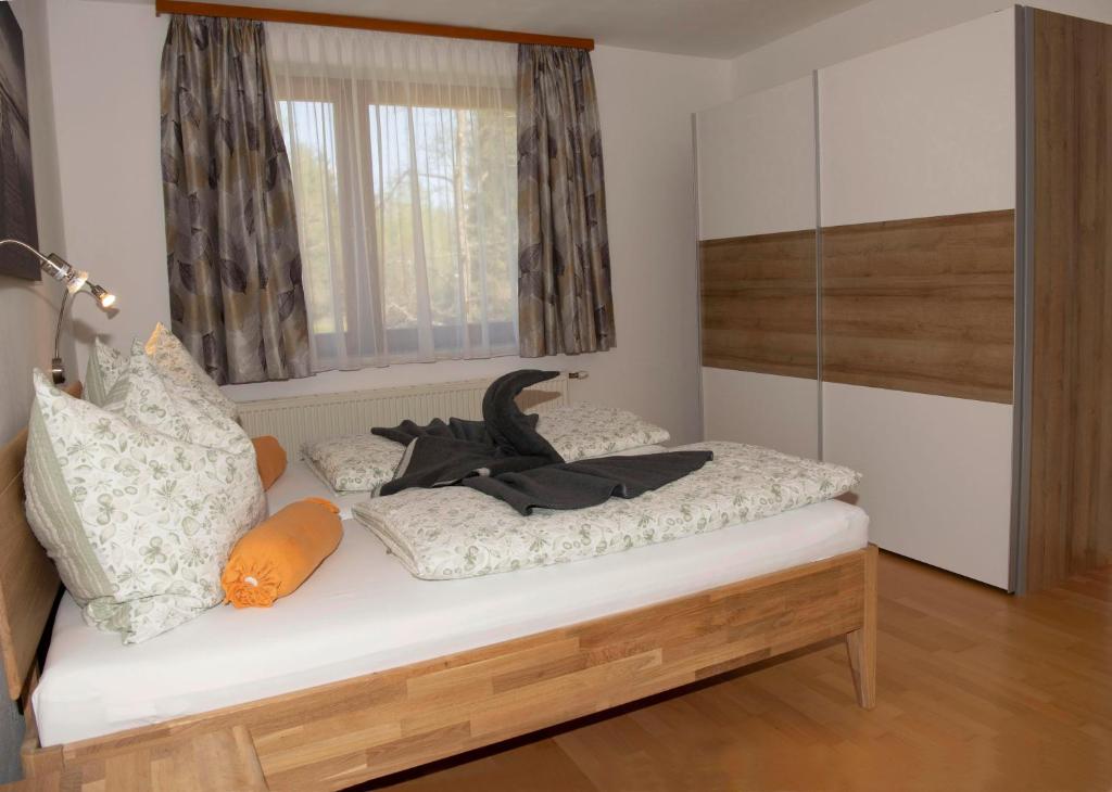 Postel nebo postele na pokoji v ubytování Ferienwohnungen Hecher