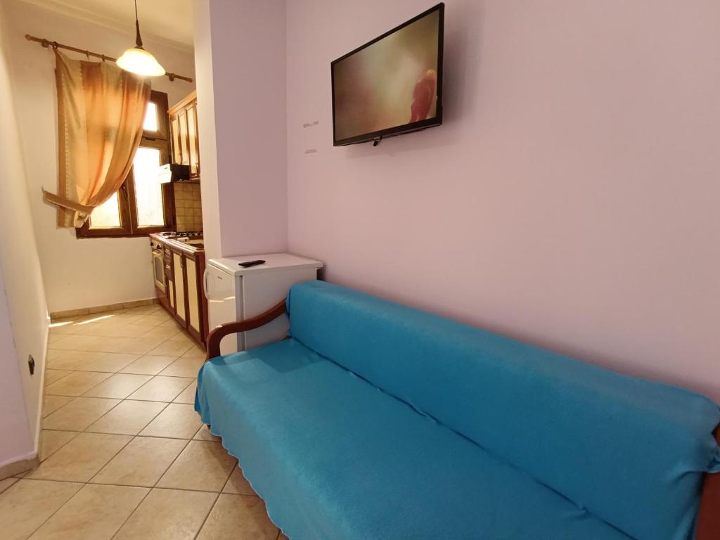 TV a/nebo společenská místnost v ubytování Hotel Mjeshtri