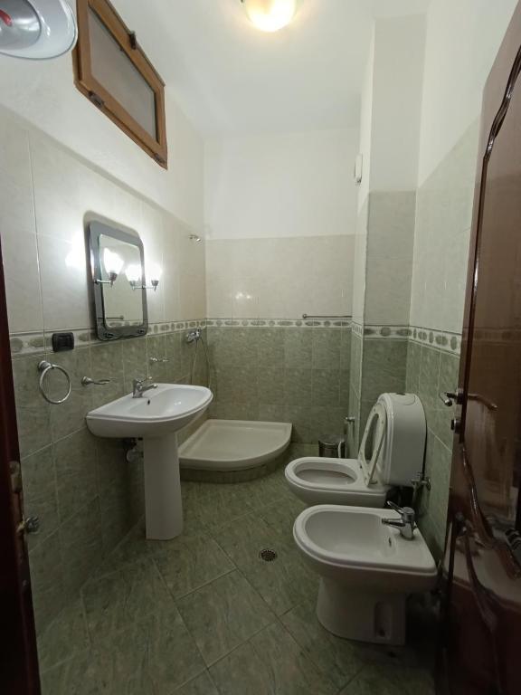 Koupelna v ubytování Hotel Mjeshtri