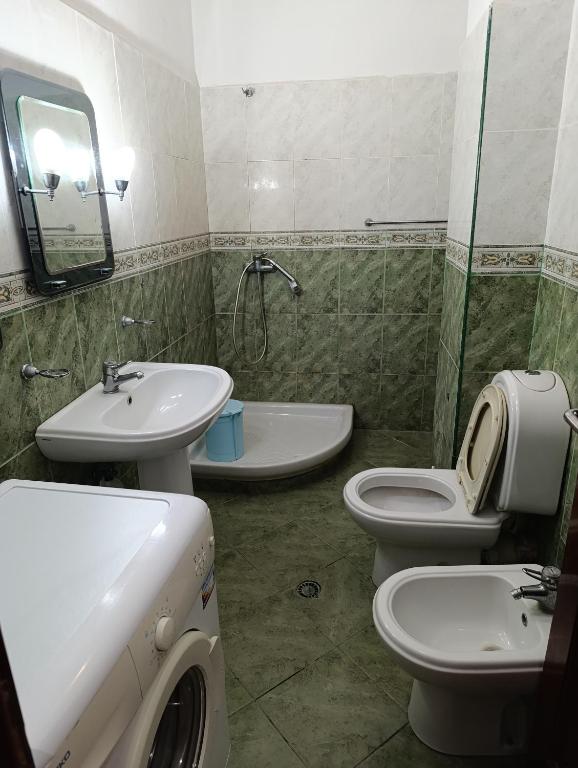 Koupelna v ubytování Hotel Mjeshtri