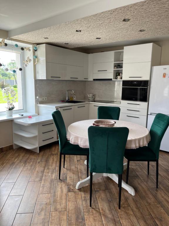 Kuchyň nebo kuchyňský kout v ubytování Guest house Kajaki-Ragaciems