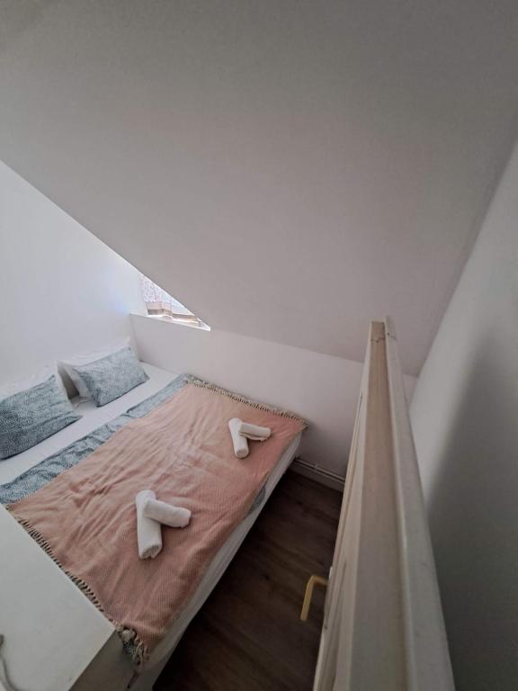 Postel nebo postele na pokoji v ubytování Vidéki Ház