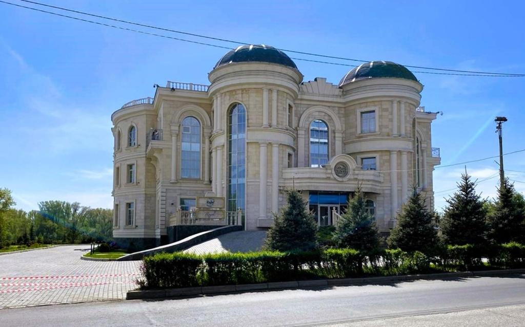 a building with a dome on top of it at Royal BV in Ustʼ-Kamenogorsk