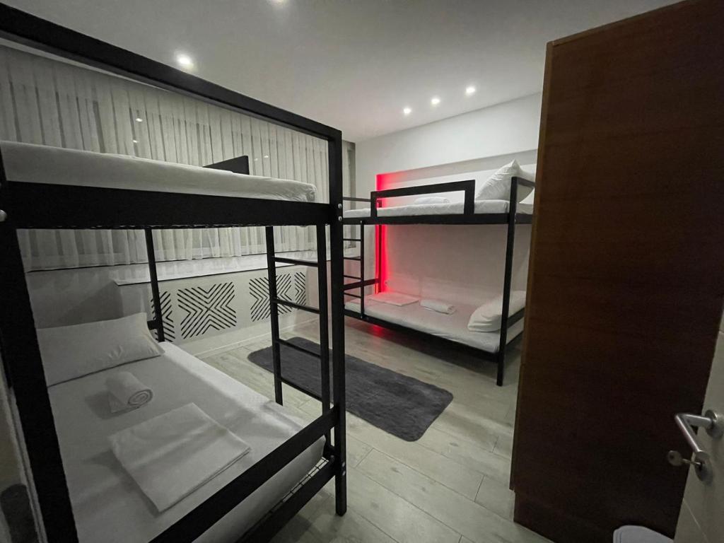 Postel nebo postele na pokoji v ubytování Shesh Hostel
