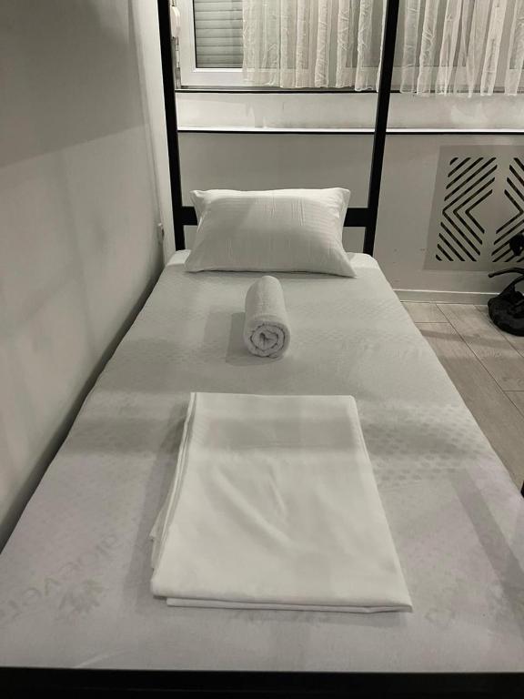 Postel nebo postele na pokoji v ubytování Shesh Hostel