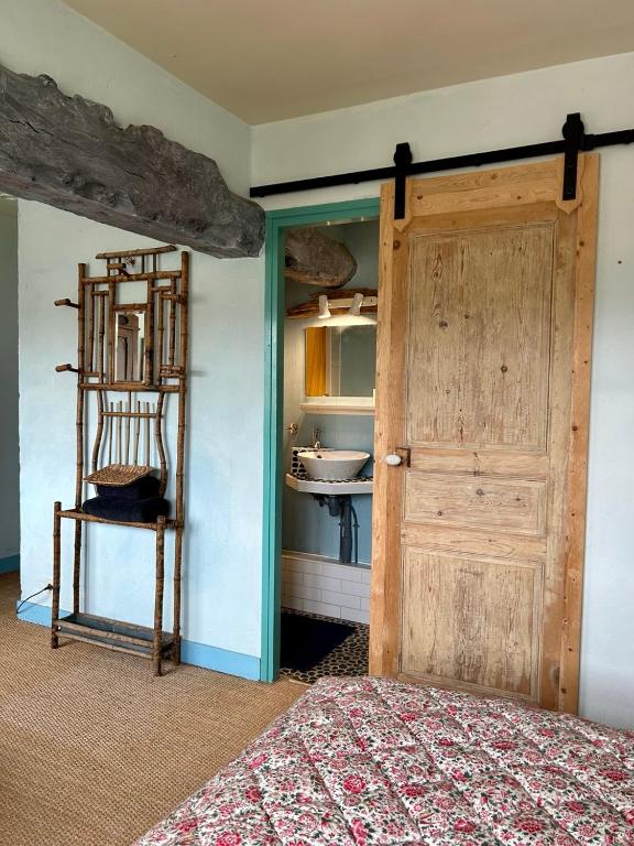 Postel nebo postele na pokoji v ubytování Chambres d'Hôtes Manoir Du Chêne