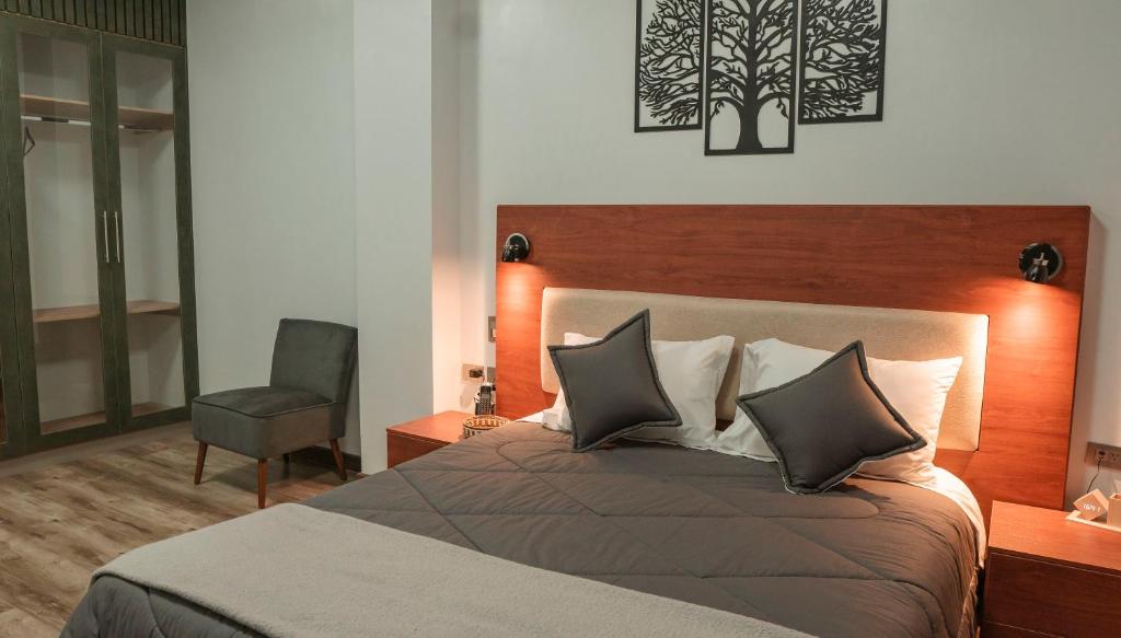Postel nebo postele na pokoji v ubytování Hotel Sacha Golden