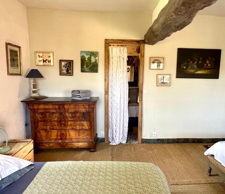 Postel nebo postele na pokoji v ubytování Chambres d'Hôtes Manoir Du Chêne
