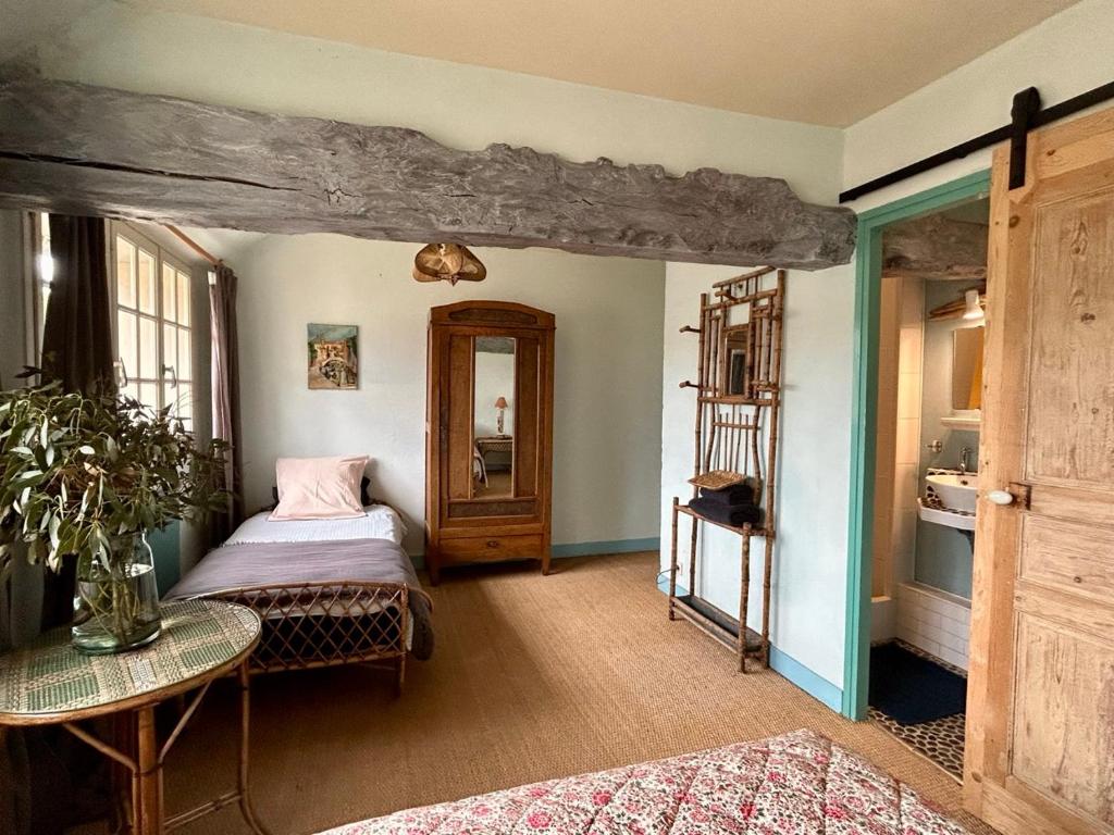Postel nebo postele na pokoji v ubytování Chambres d'Hôtes Manoir Du Chêne