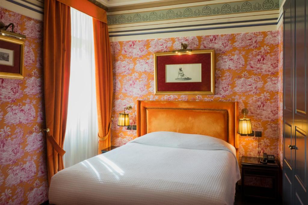 Posteľ alebo postele v izbe v ubytovaní Maison Grecque Hotel Extraordinaire