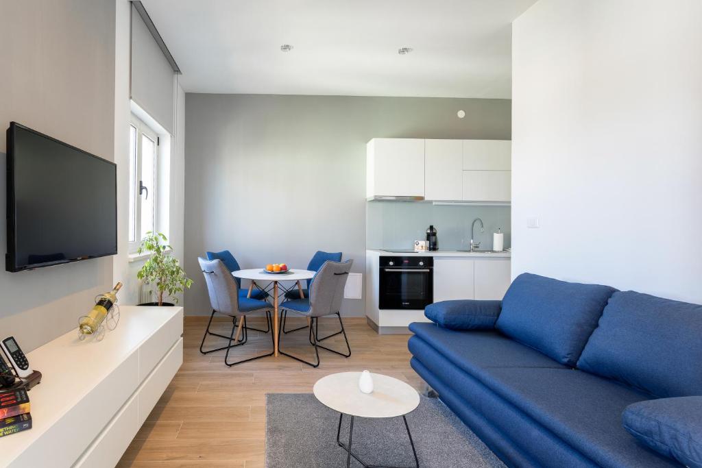 Kuchyň nebo kuchyňský kout v ubytování Apartmani Jakić 2