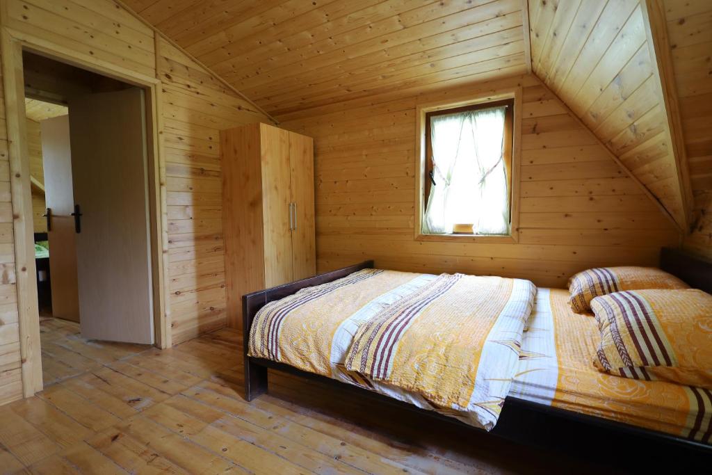 Postel nebo postele na pokoji v ubytování Drina Na Vodi
