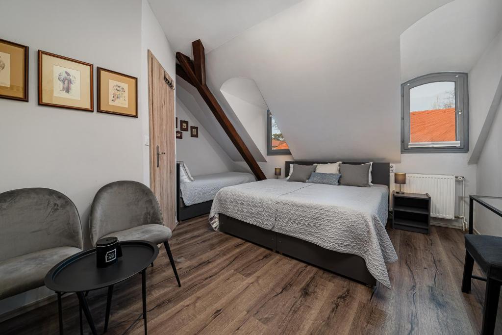 Postel nebo postele na pokoji v ubytování BLAHA ROOMS