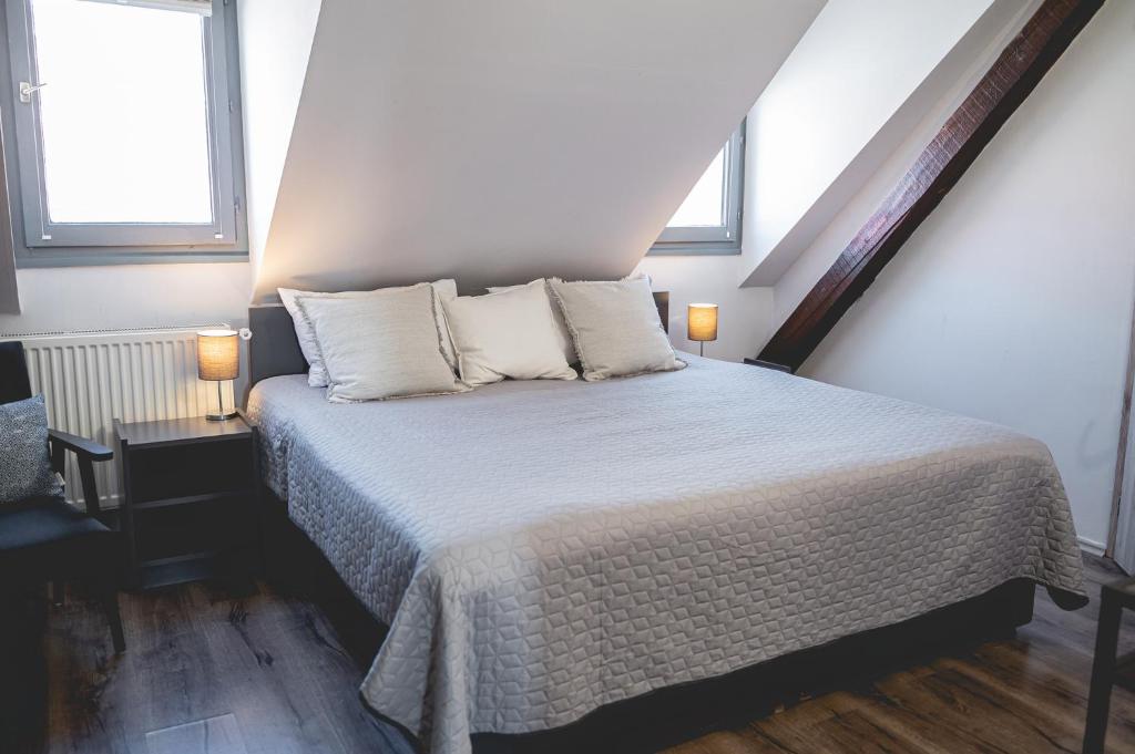 Postel nebo postele na pokoji v ubytování BLAHA ROOMS