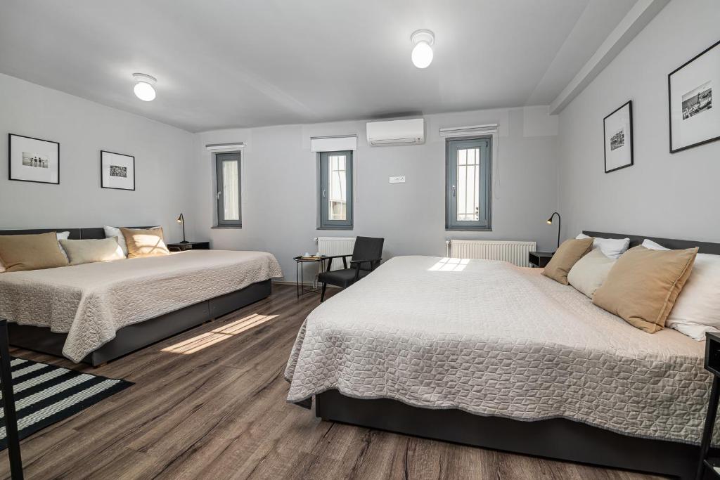 Postel nebo postele na pokoji v ubytování BLAHA ROOMS