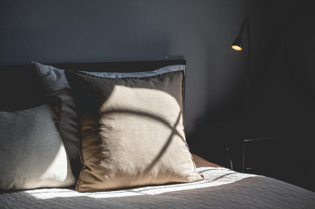 Postel nebo postele na pokoji v ubytování BLAHA ROOMS